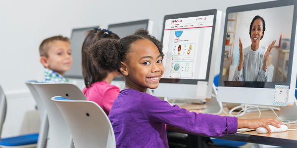 image-of-child-with-tutor-on-computer-screen